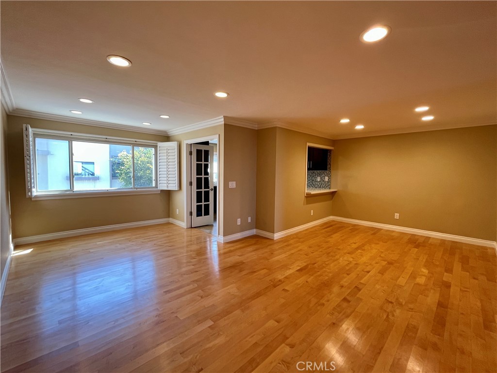 28115 Ridgepoint Court Rancho Palos Verdes, CA 90275 - Photo 12 of 31 an empty room with wooden floor and windows