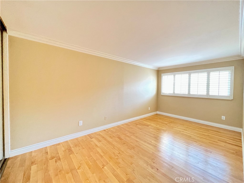 28115 Ridgepoint Court Rancho Palos Verdes, CA 90275 - Photo 25 of 31 a view of an empty room with wooden floor and a window