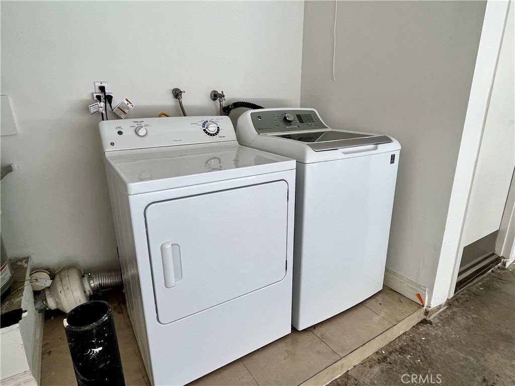 28115 Ridgepoint Court Rancho Palos Verdes, CA 90275 - Photo 28 of 31 a utility room with dryer and washer