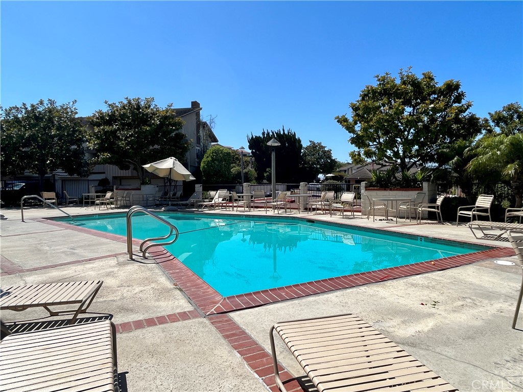 28115 Ridgepoint Court Rancho Palos Verdes, CA 90275 - Photo 30 of 31 a swimming pool with an outdoor space and seating area