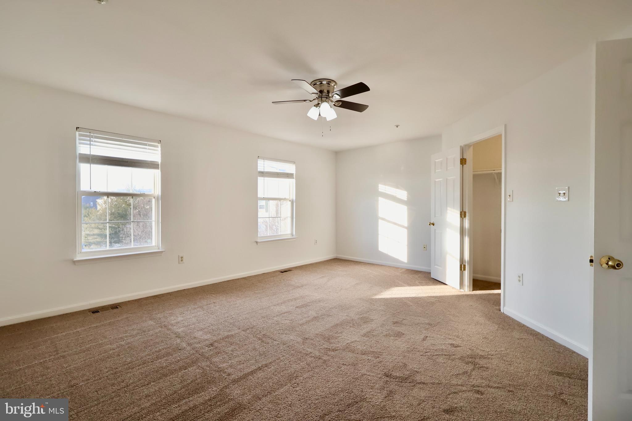 303 Three Sirens Odenton, MD 21113 - Photo 14 of 24 a view of an empty room with a window