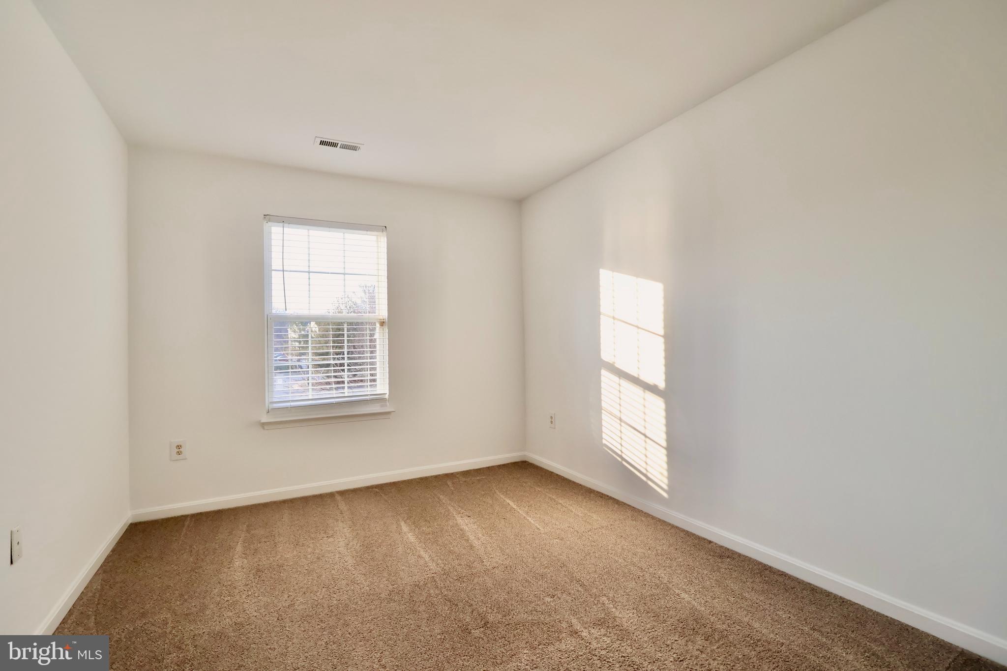 303 Three Sirens Odenton, MD 21113 - Photo 21 of 24 an empty room with windows