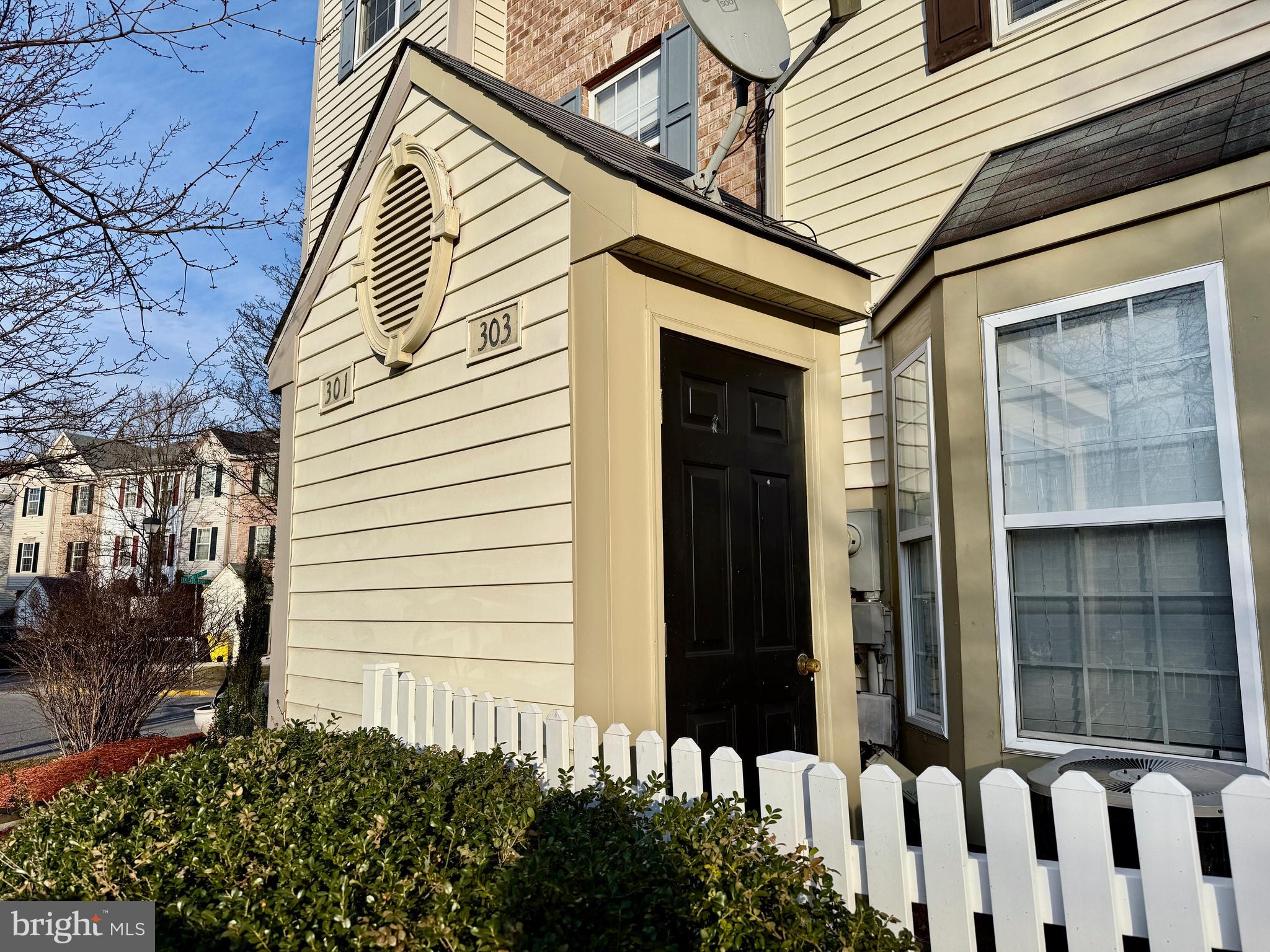 303 Three Sirens Odenton, MD 21113 - Photo 24 of 24 a view of a house with a small porch