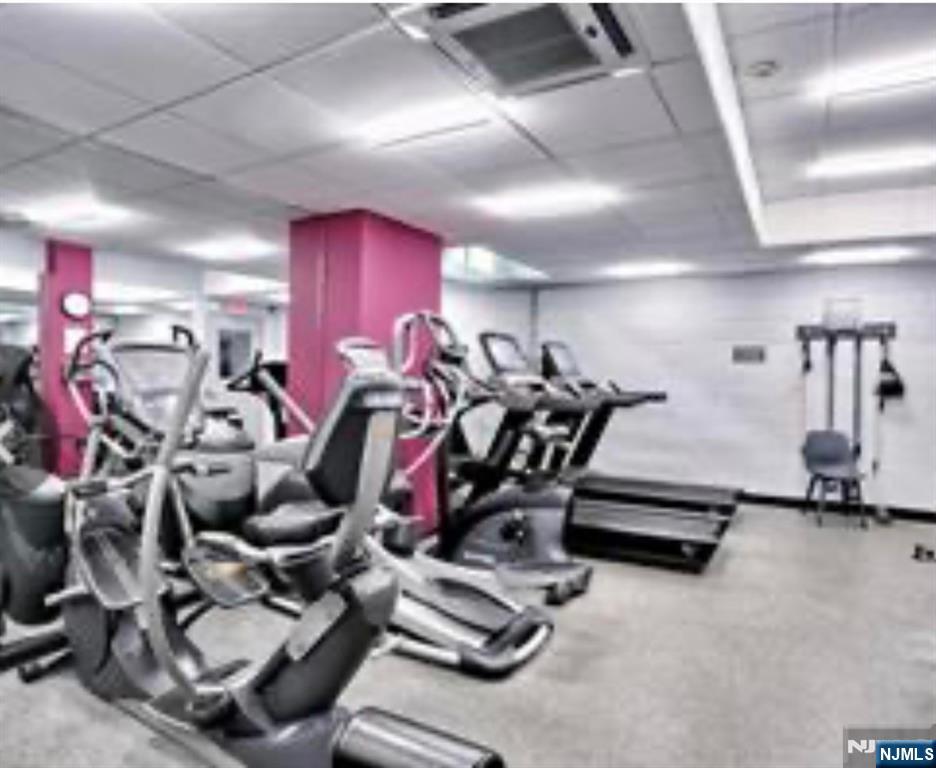 280 Prospect Avenue, Unit 5D Hackensack, NJ 07601 - Photo 7 of 21 a view of a room with gym equipment