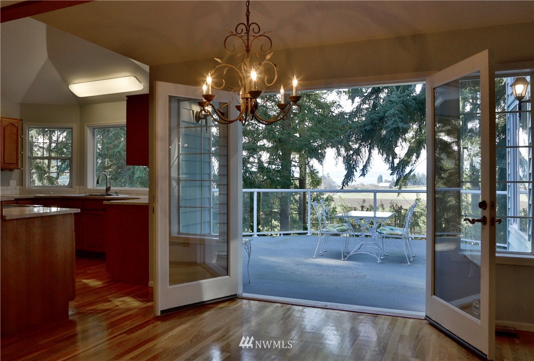 5621 Cameron Road Freeland, WA 98249 - Photo 6 of 25 a view of a glass door with a porch
