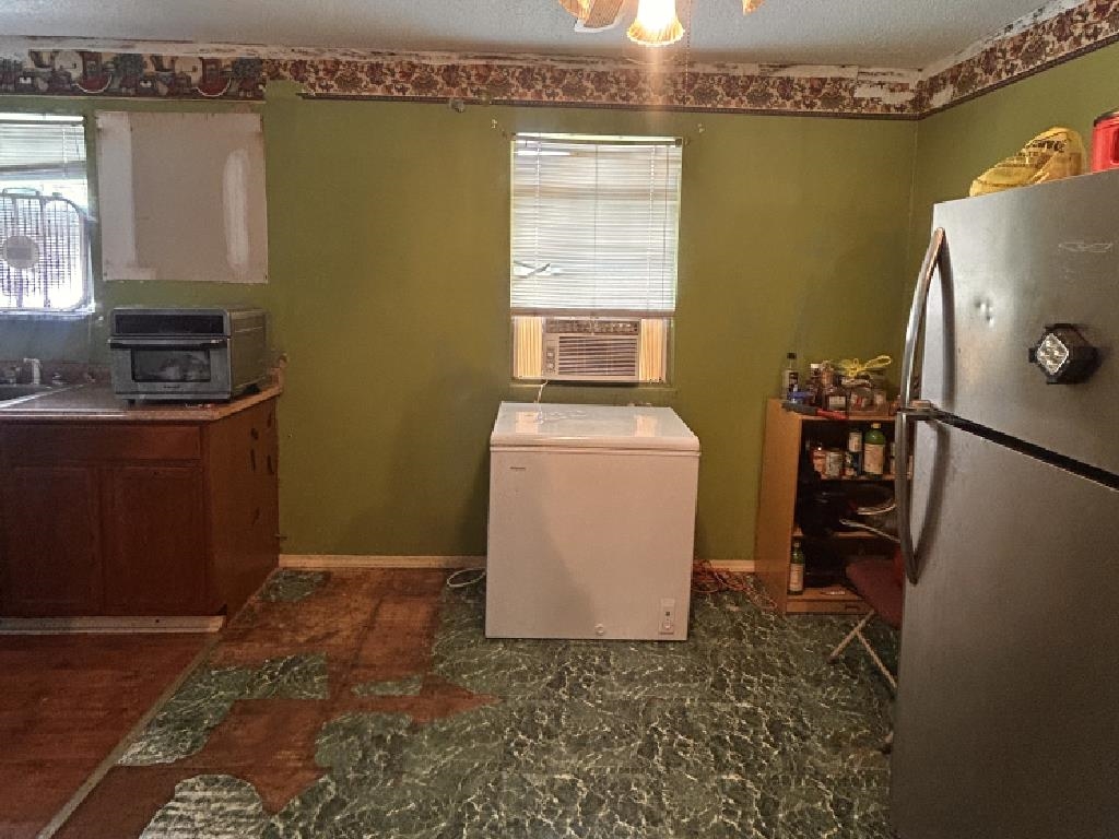 210 Griffin Road Mason, TN 38049 - Photo 6 of 13 a utility room with dryer and washer