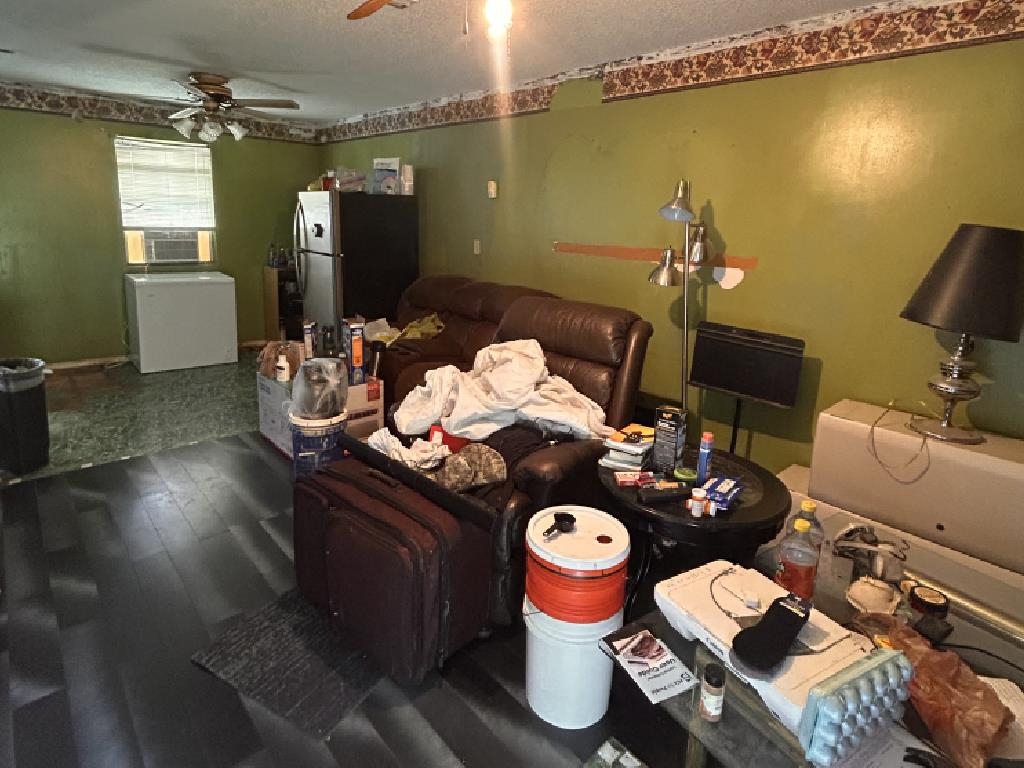 210 Griffin Road Mason, TN 38049 - Photo 9 of 13 a table and chairs in wooden floor