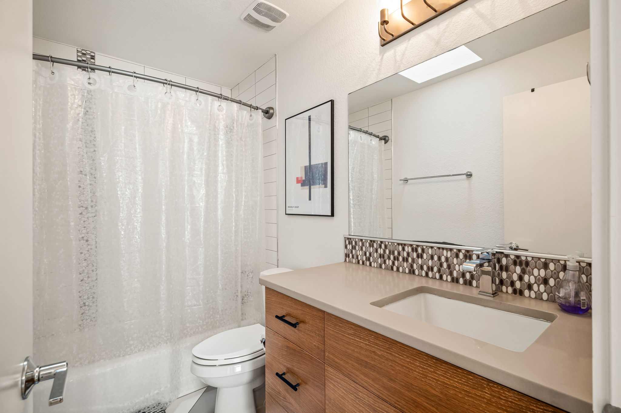 1124 Linden Street, Unit B Austin, TX 78702 - Photo 14 of 26 Full bath with vanity and shower / bath combo