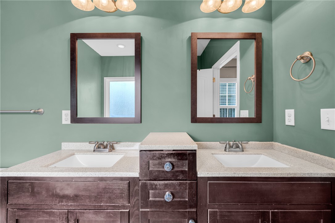 5 Drakeford Court Anderson, SC 29621 - Photo 35 of 46 Double vanity sinks anchor this updated bathroom space with ample built-in cabinet storage.