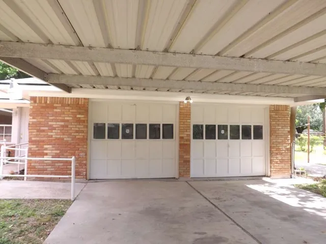 a view of a large room with windows