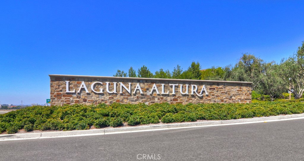 98 Cipresso Irvine, CA 92618 - Photo 26 of 59 a street sign that is on a pole