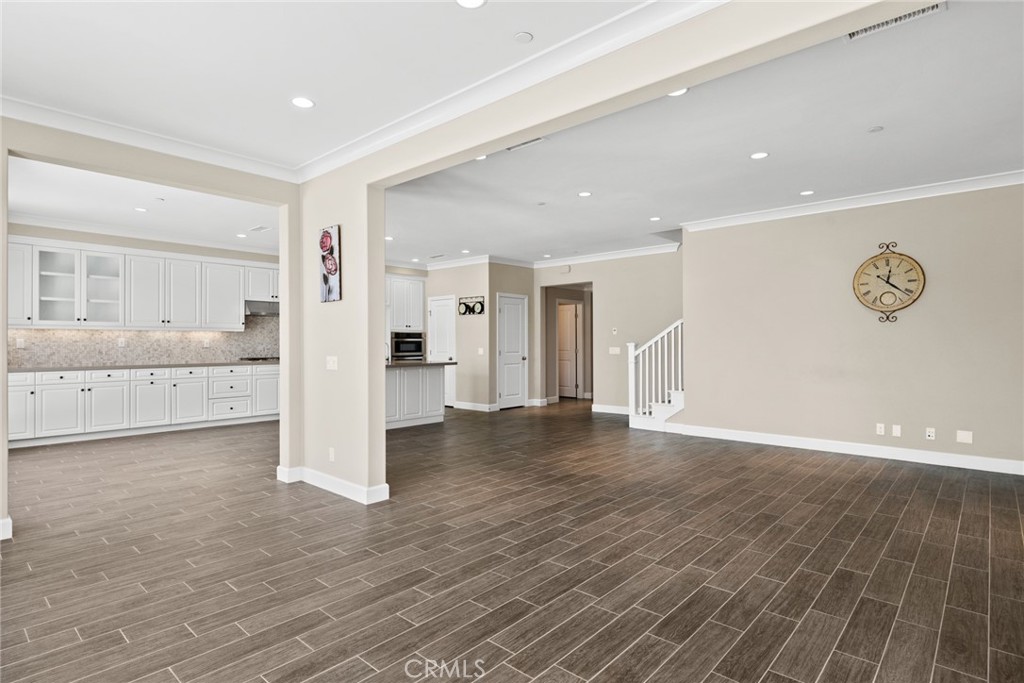 98 Cipresso Irvine, CA 92618 - Photo 6 of 59 a view of a big room with wooden floor and windows