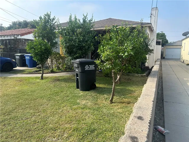 a backyard of a house with lots of green space