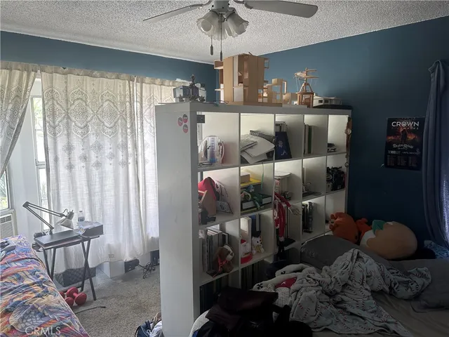 a room with lots of different colored cloths