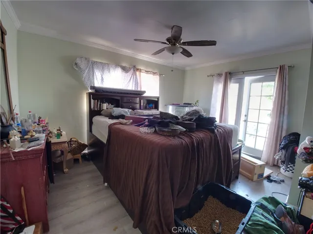 a bed room with a bed and a window