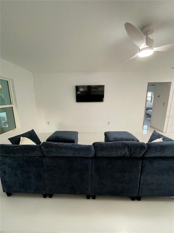 16102 1st Street East Redington Beach, FL 33708 - Photo 9 of 39 a living room with furniture