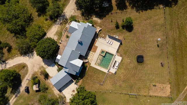 a front view of a house with swimming pool