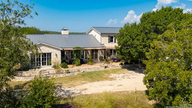 a kitchen with a stove top oven and cabinets