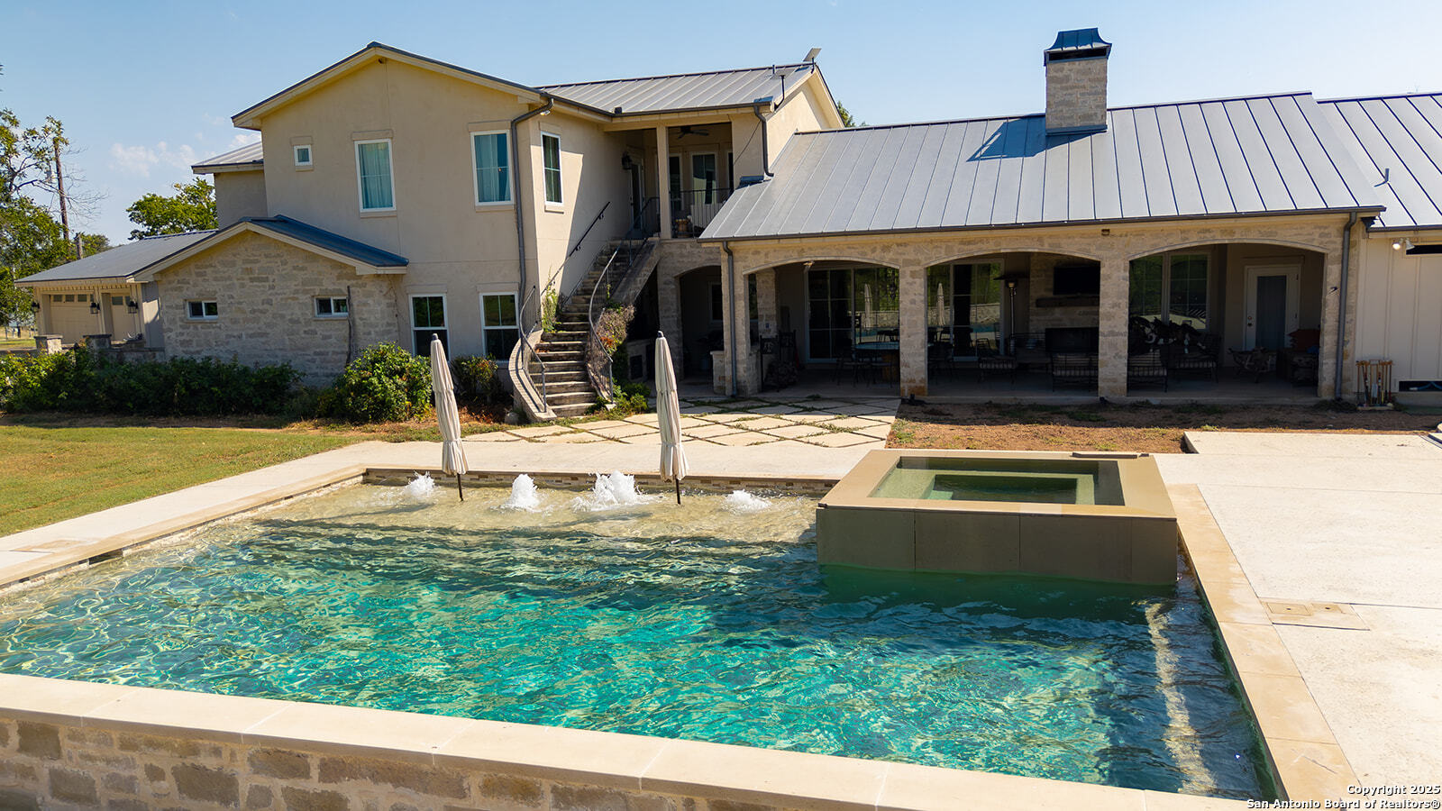 3067 Ranch Road 1888 Blanco, TX 78606 - Photo 19 of 59 a view of a house with swimming pool