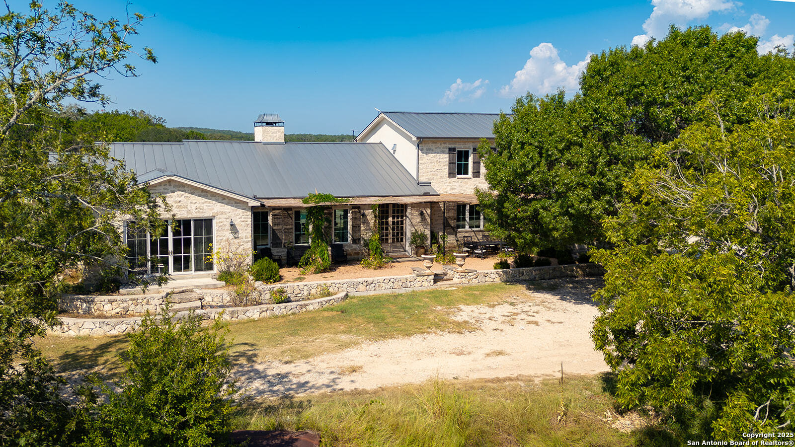 3067 Ranch Road 1888 Blanco, TX 78606 - Photo 20 of 59 a view of a house with snow on the background