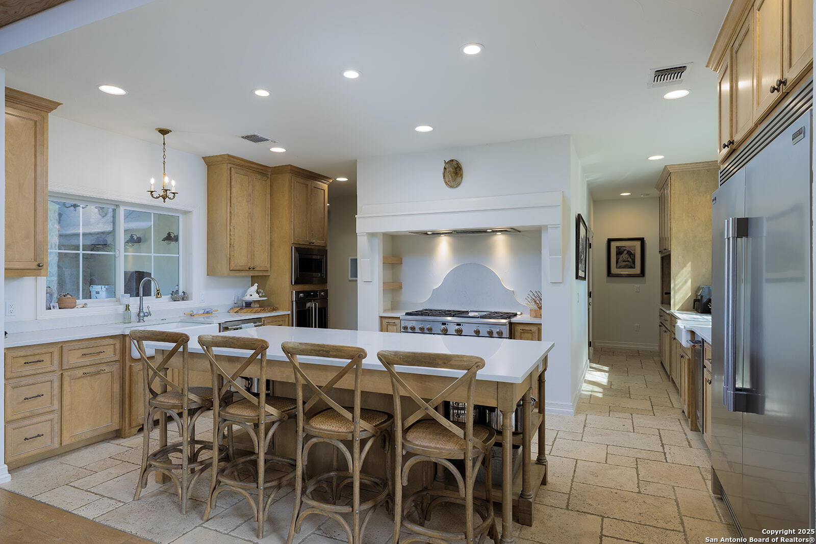 3067 Ranch Road 1888 Blanco, TX 78606 - Photo 21 of 59 a large kitchen with a table and chairs