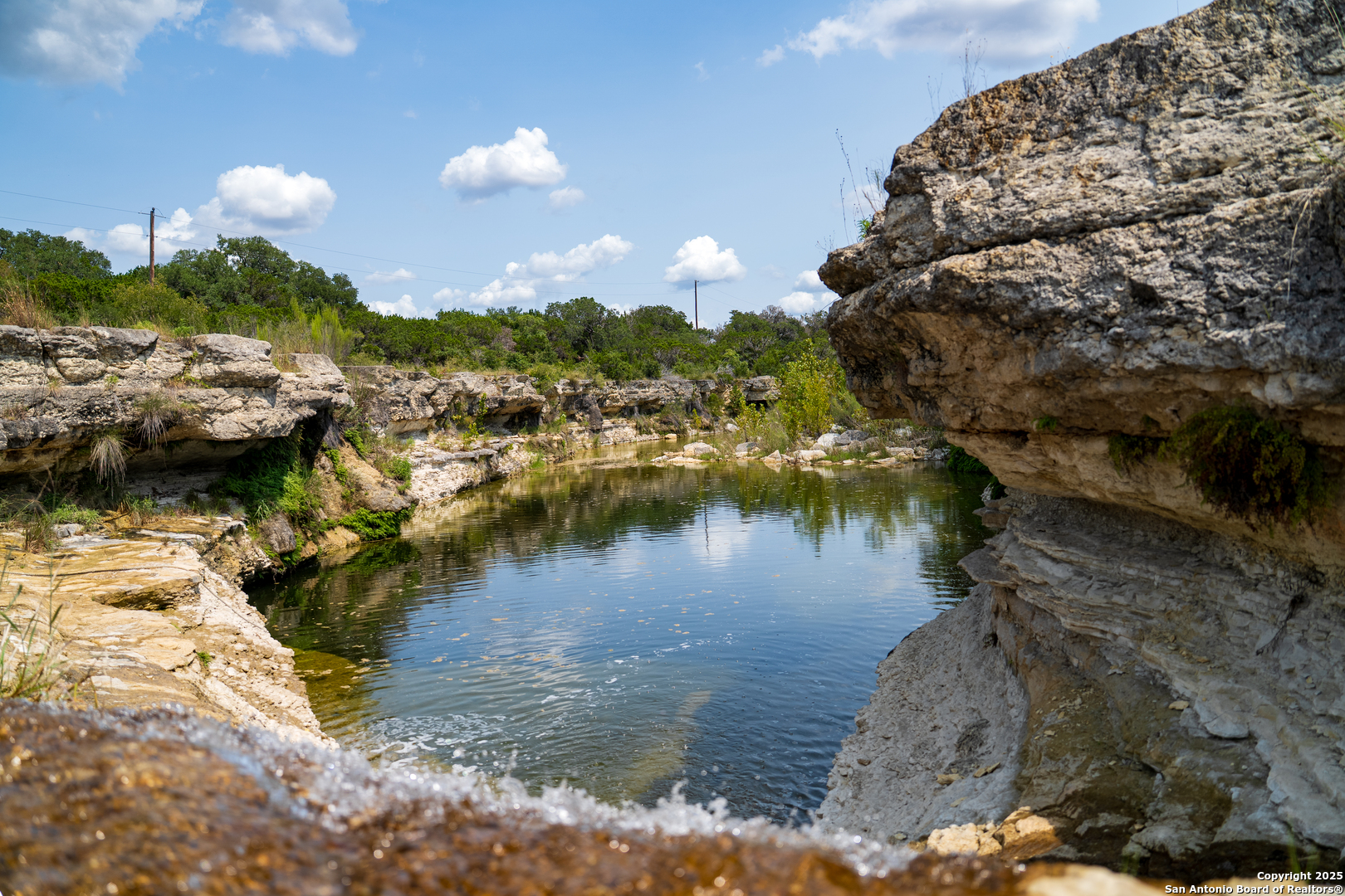 3067 Ranch Road 1888 Blanco, TX 78606 - Photo 58 of 59 a view of a lake in between two and trees