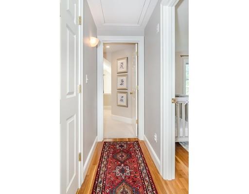 1 Woodridge Road Wellesley, MA 02482 - Photo 13 of 26 a view of a hallway with wooden floor and a bathroom