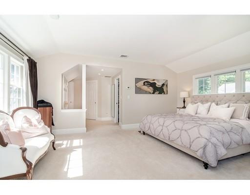 1 Woodridge Road Wellesley, MA 02482 - Photo 15 of 26 a bedroom with a bed and a couch