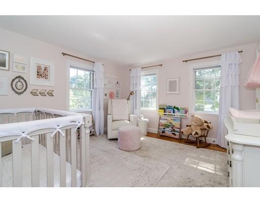 1 Woodridge Road Wellesley, MA 02482 - Photo 18 of 26 a bedroom with furniture and a large window