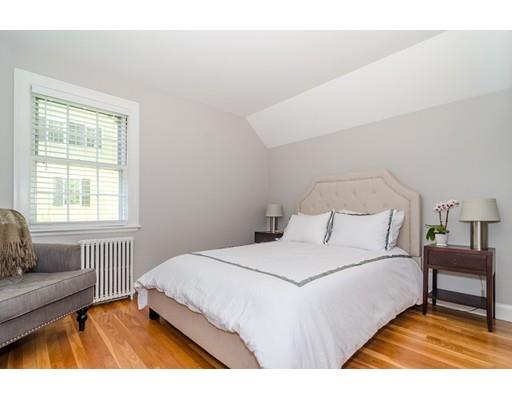 1 Woodridge Road Wellesley, MA 02482 - Photo 19 of 26 a bedroom with a bed and a couch