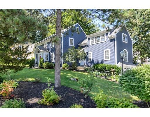 1 Woodridge Road Wellesley, MA 02482 - Photo 2 of 26 a front view of a house with a yard