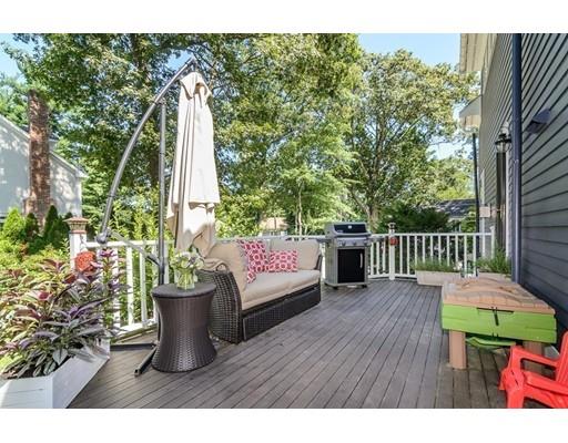 1 Woodridge Road Wellesley, MA 02482 - Photo 23 of 26 a view of a deck with a chair and floor
