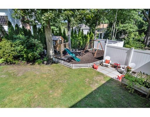 1 Woodridge Road Wellesley, MA 02482 - Photo 25 of 26 a view of a backyard with plants and patio