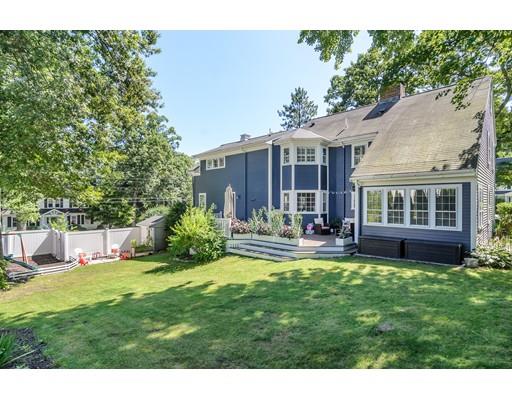 1 Woodridge Road Wellesley, MA 02482 - Photo 26 of 26 a view of a house with a big yard potted plants and large tree