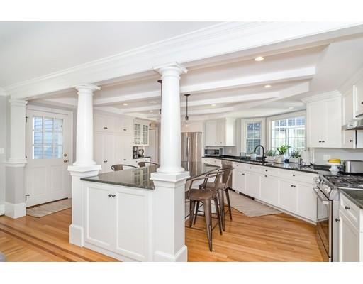 1 Woodridge Road Wellesley, MA 02482 - Photo 6 of 26 a kitchen with a sink and cabinets