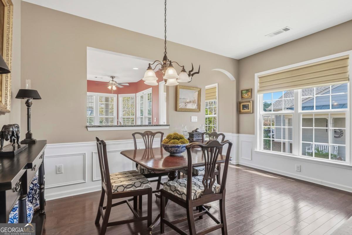 1320 Summer Hollow Road Greensboro, GA 30642 - Photo 14 of 45 a view of a dining room with furniture and window
