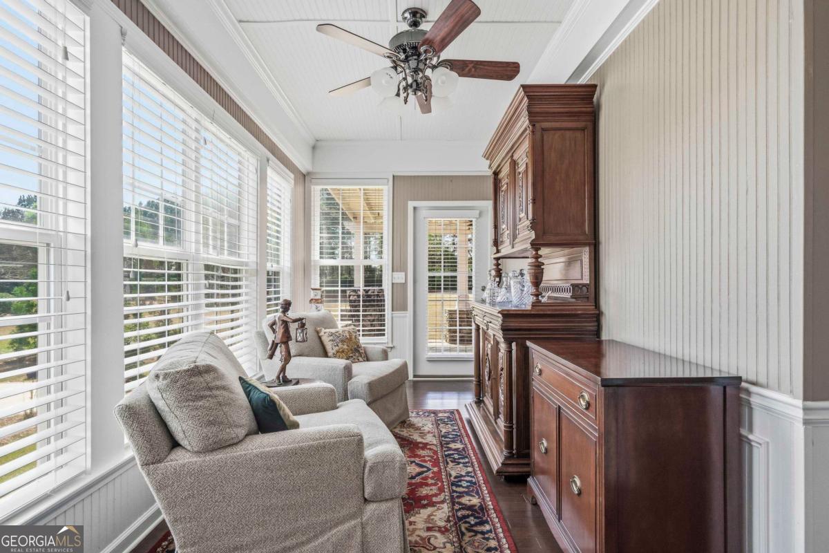 1320 Summer Hollow Road Greensboro, GA 30642 - Photo 22 of 45 a living room with furniture and a window