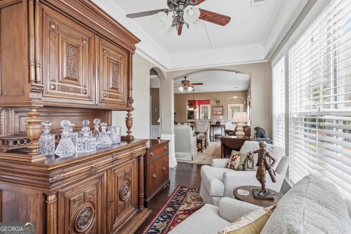 1320 Summer Hollow Road Greensboro, GA 30642 - Photo 25 of 45 a living room with furniture and a large window