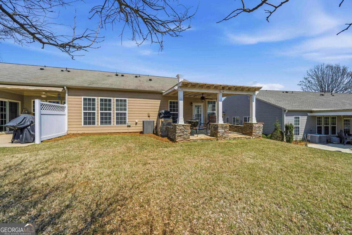 1320 Summer Hollow Road Greensboro, GA 30642 - Photo 37 of 45 a view of a house with a patio