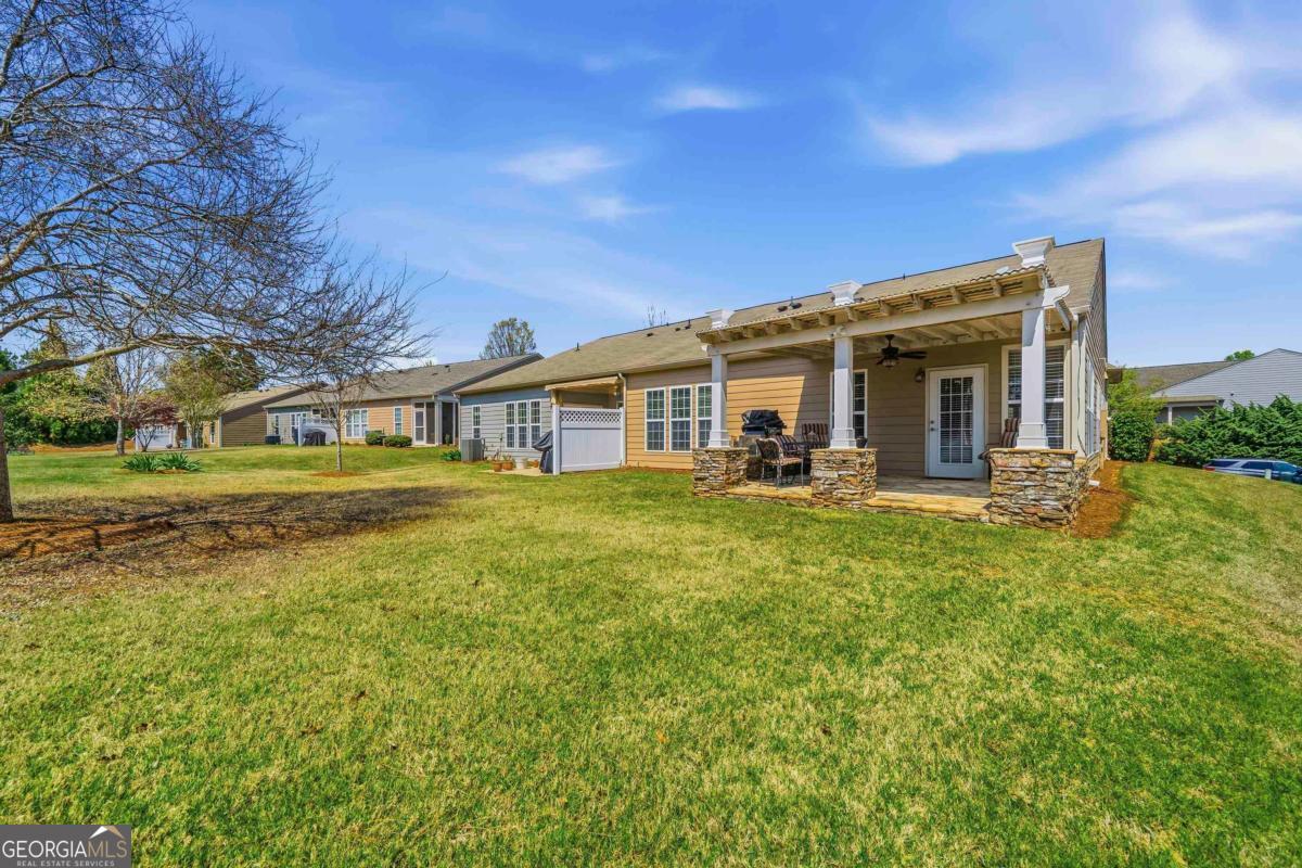 1320 Summer Hollow Road Greensboro, GA 30642 - Photo 38 of 45 a view of a house with backyard and porch