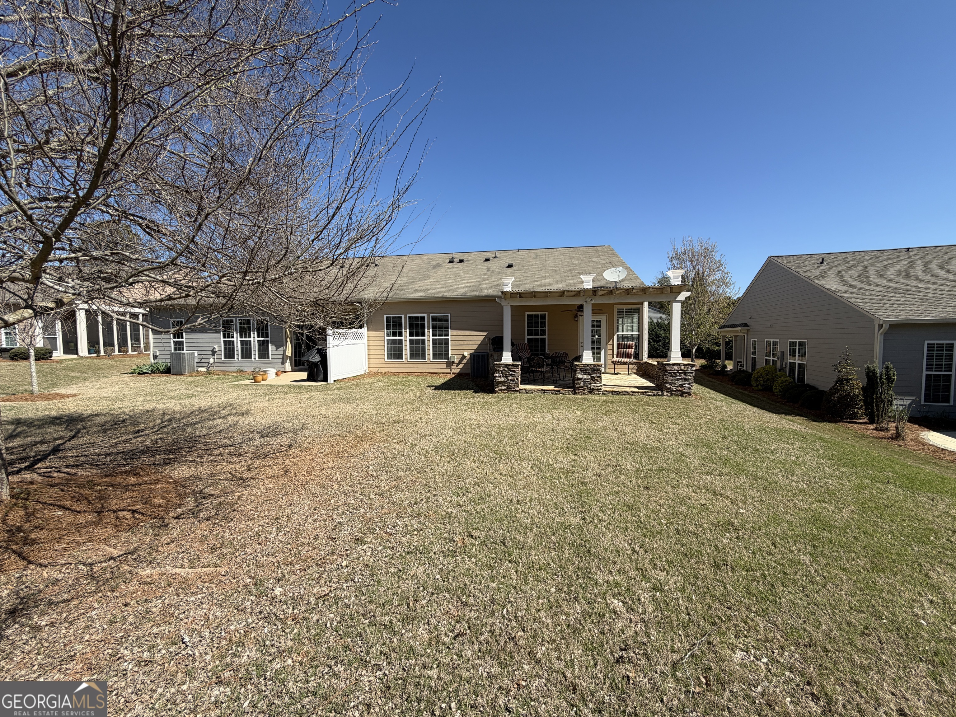 1320 Summer Hollow Road Greensboro, GA 30642 - Photo 41 of 45 a front view of a building with a yard