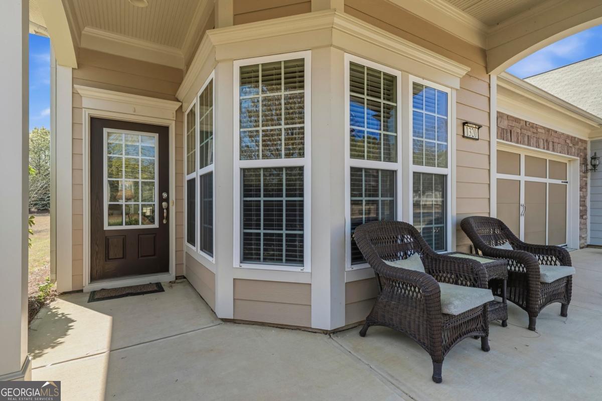 1320 Summer Hollow Road Greensboro, GA 30642 - Photo 5 of 45 a view of a entryway with seating space