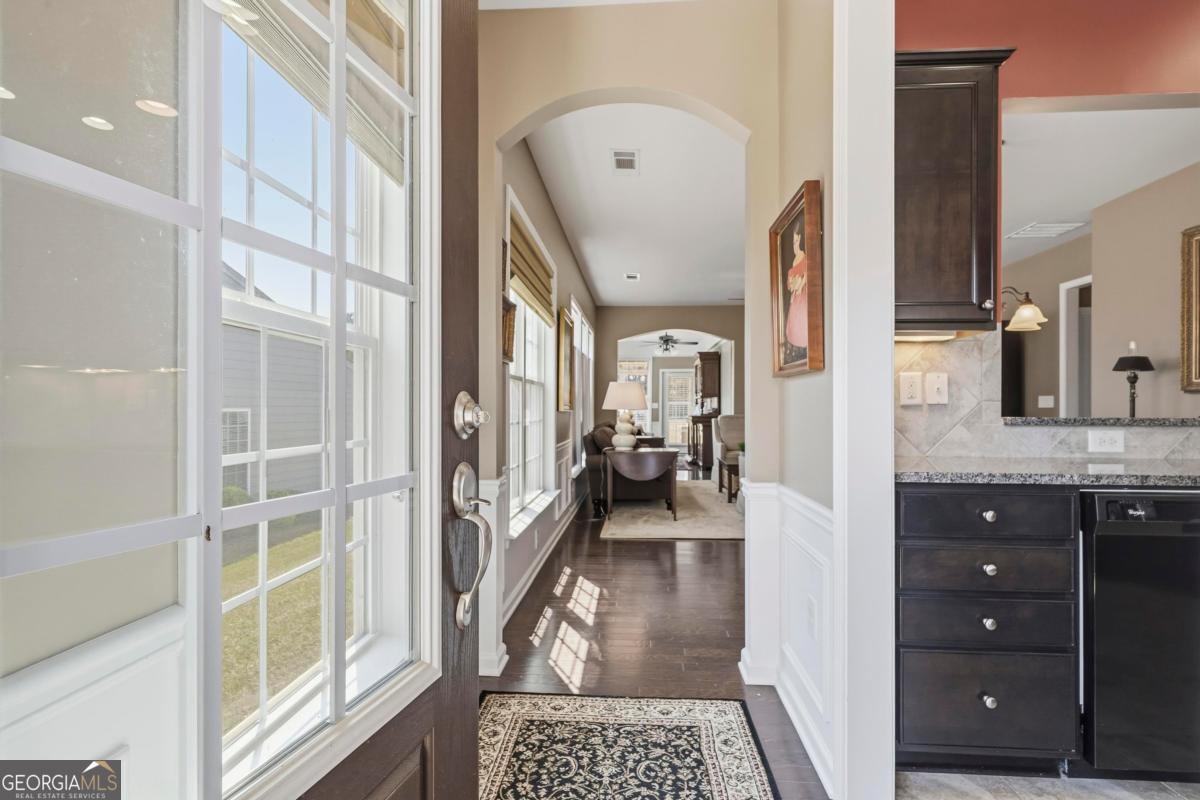 1320 Summer Hollow Road Greensboro, GA 30642 - Photo 6 of 45 a en suite bathroom with a sink and a mirror