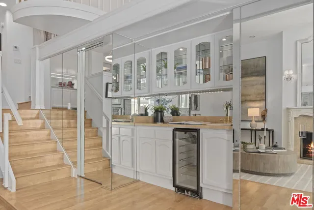 a kitchen with stainless steel appliances granite countertop a stove and cabinets