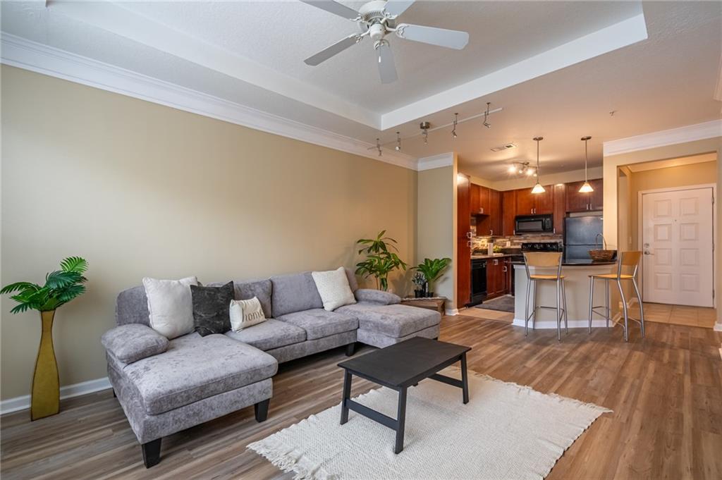 400 17th Street Northwest, Unit 1453 Atlanta, GA 30363 - Photo 7 of 27 a living room with furniture and kitchen view