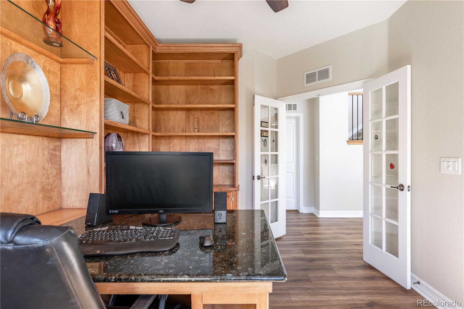 1610 Ridgetrail Court Castle Rock, CO 80104 - Photo 14 of 50 a living room with furniture and a flat screen tv