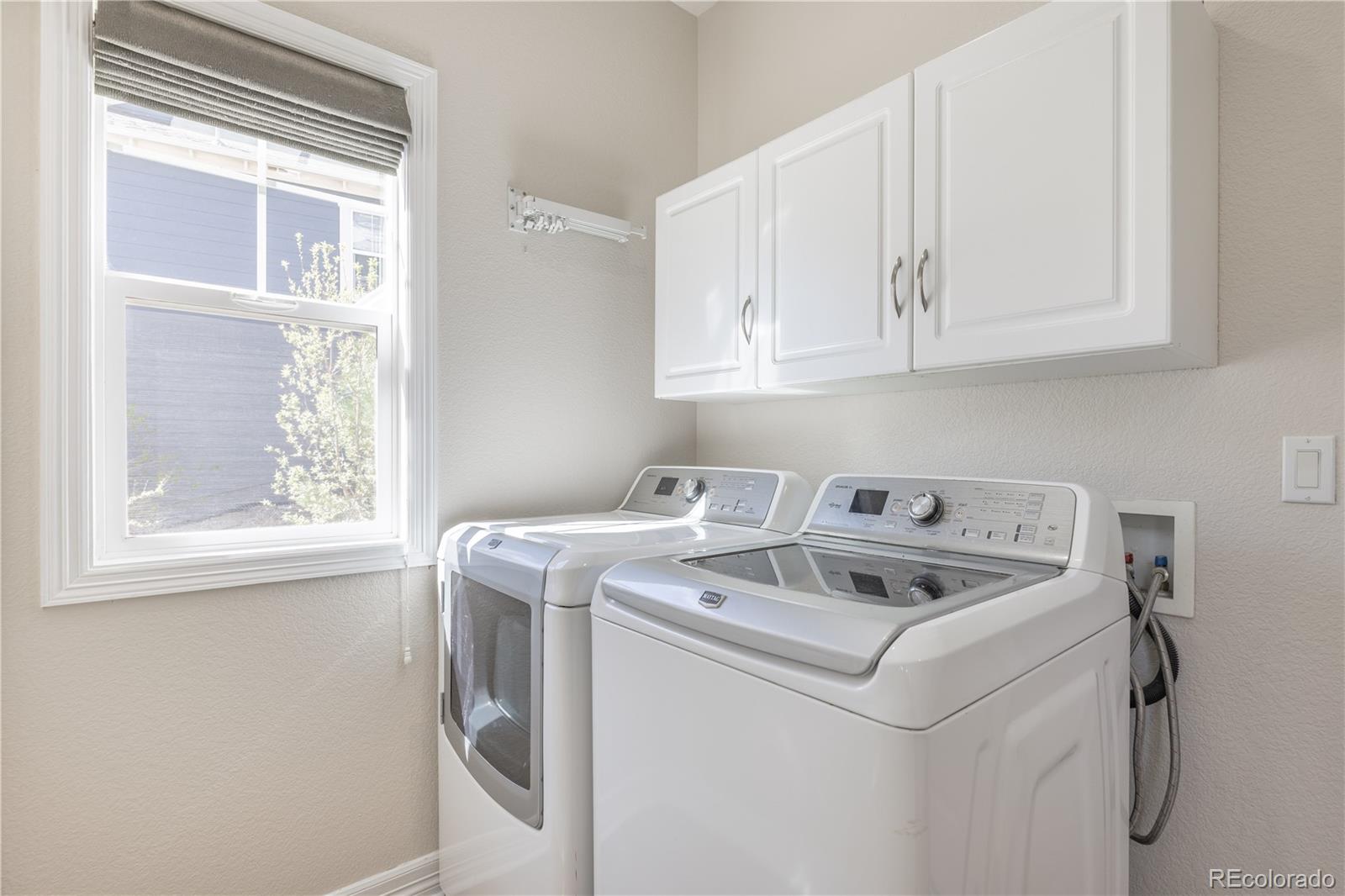 1610 Ridgetrail Court Castle Rock, CO 80104 - Photo 16 of 50 a utility room with dryer and washer