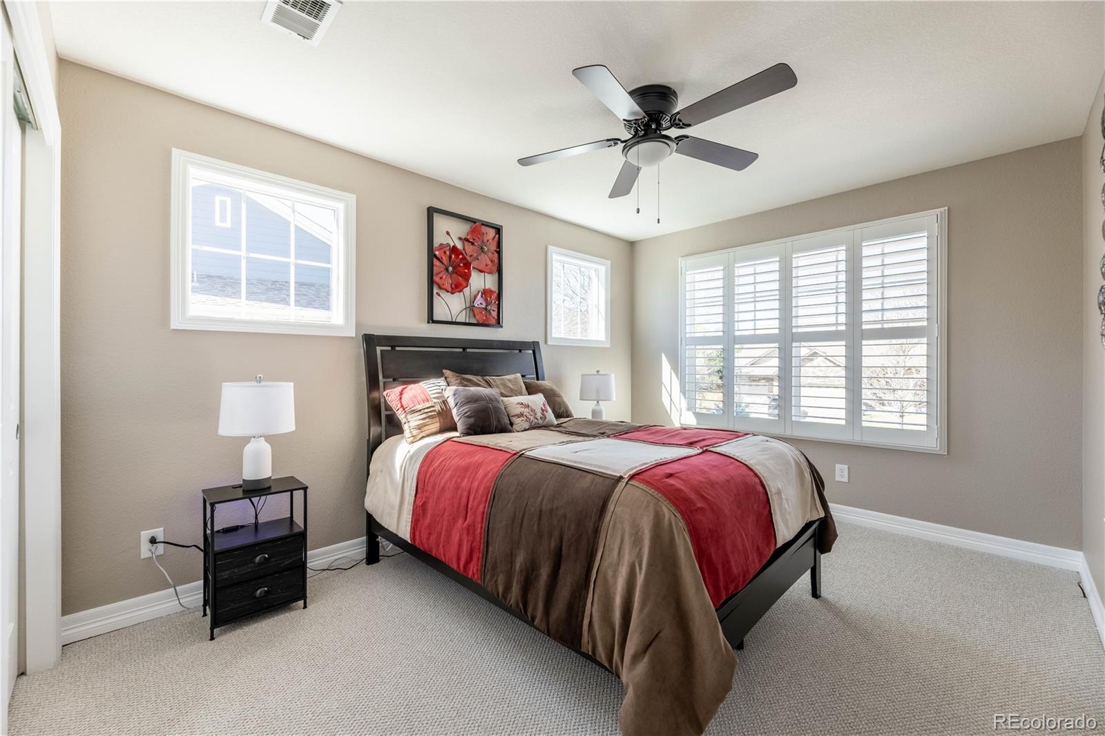 1610 Ridgetrail Court Castle Rock, CO 80104 - Photo 23 of 50 a bed room with a bed and a window