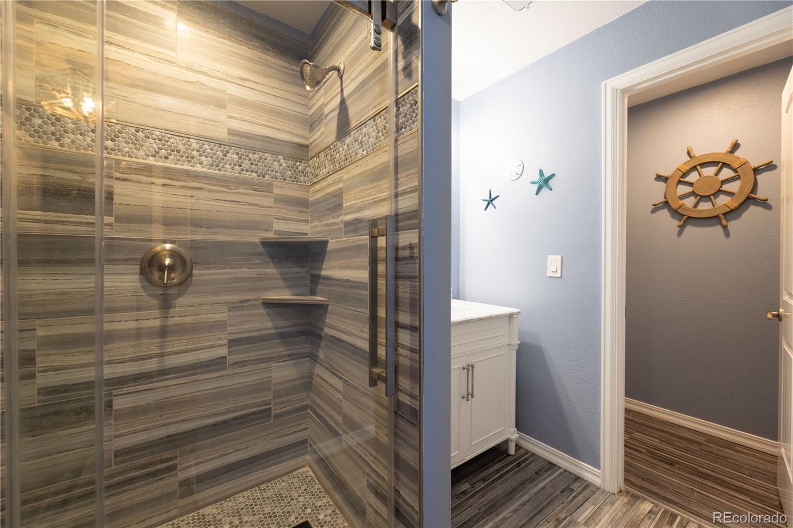 1610 Ridgetrail Court Castle Rock, CO 80104 - Photo 36 of 50 a bathroom with a shower