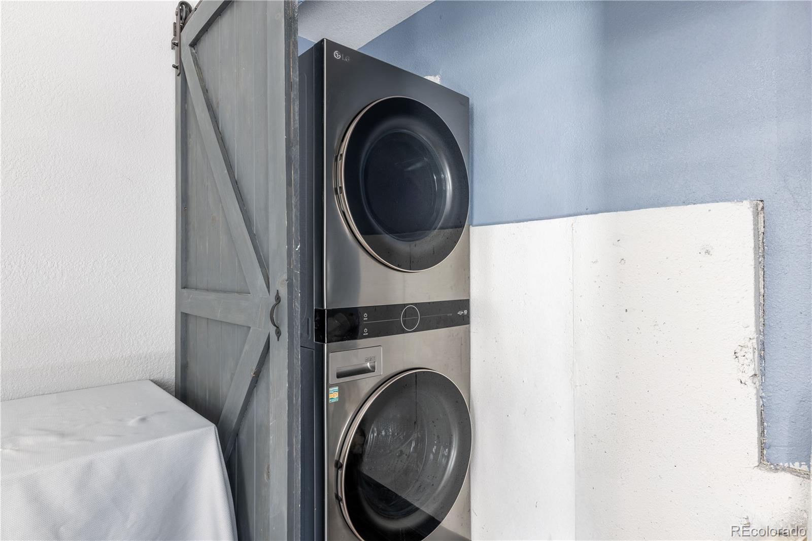 1610 Ridgetrail Court Castle Rock, CO 80104 - Photo 38 of 50 a utility room with dryer and washer